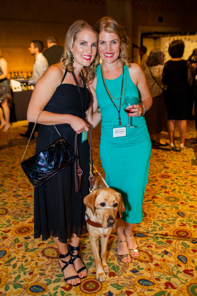 Joy Thomas and Jenelle Landgraf posing with Roja at the Gala